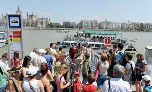 Boats and cars in the Danube